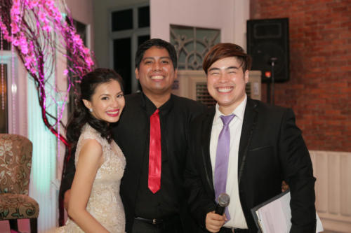 Ganns Deen, a Filipino wedding host in Canberra, with groom Dan and bride Ana 
